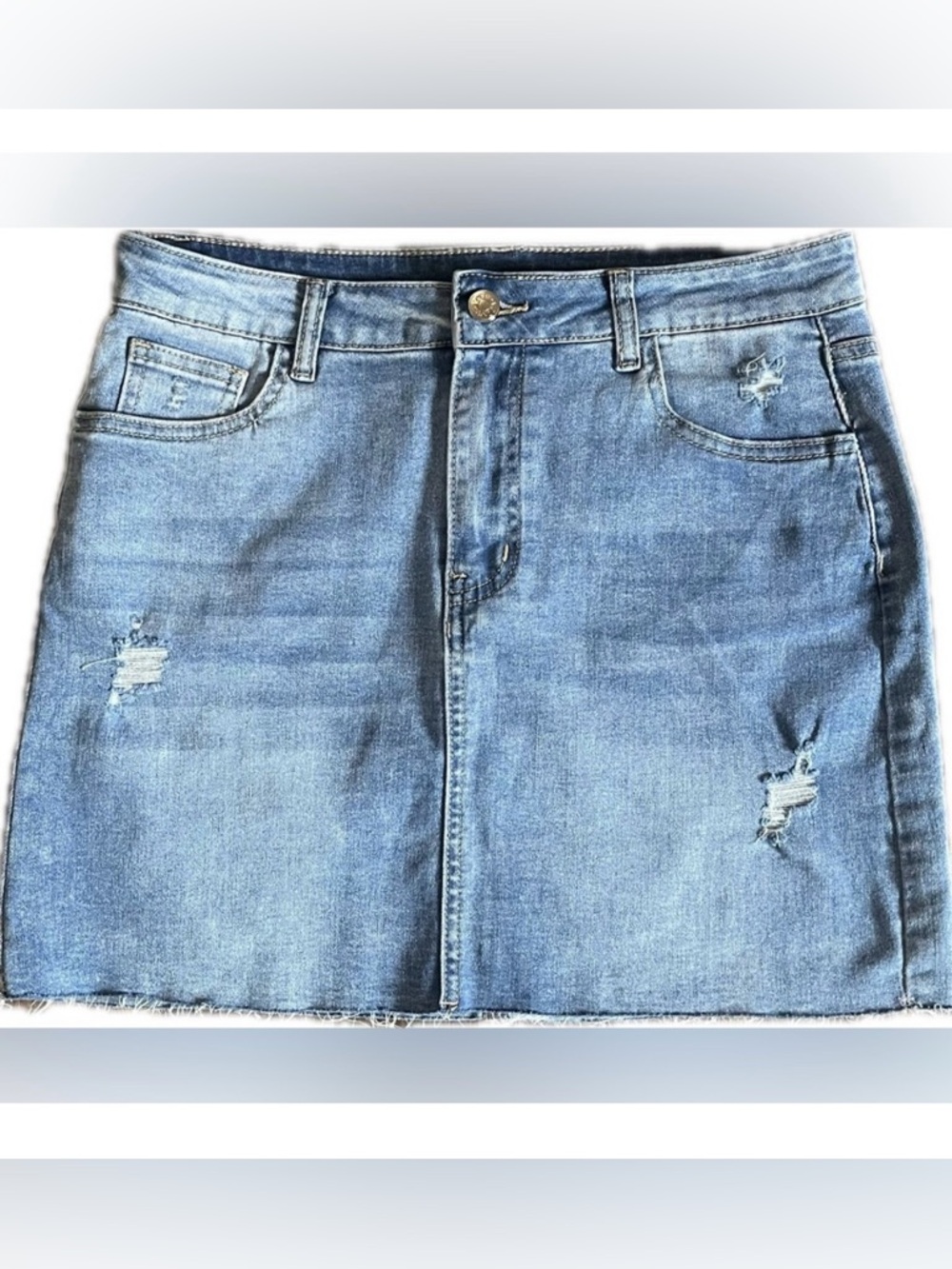 Distressed Denim Mini Skirt. Chic & trendy. Excellent condition. Women’s size 6.